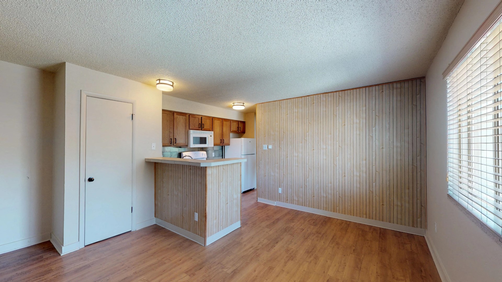 Hardwood floor in the living area at 1443 Elizabeth in Denver, CO